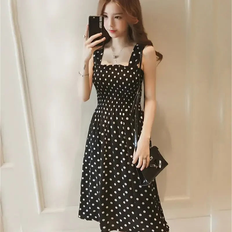 Women's sleeveless polka dot chiffon long dress with an elegant square neckline