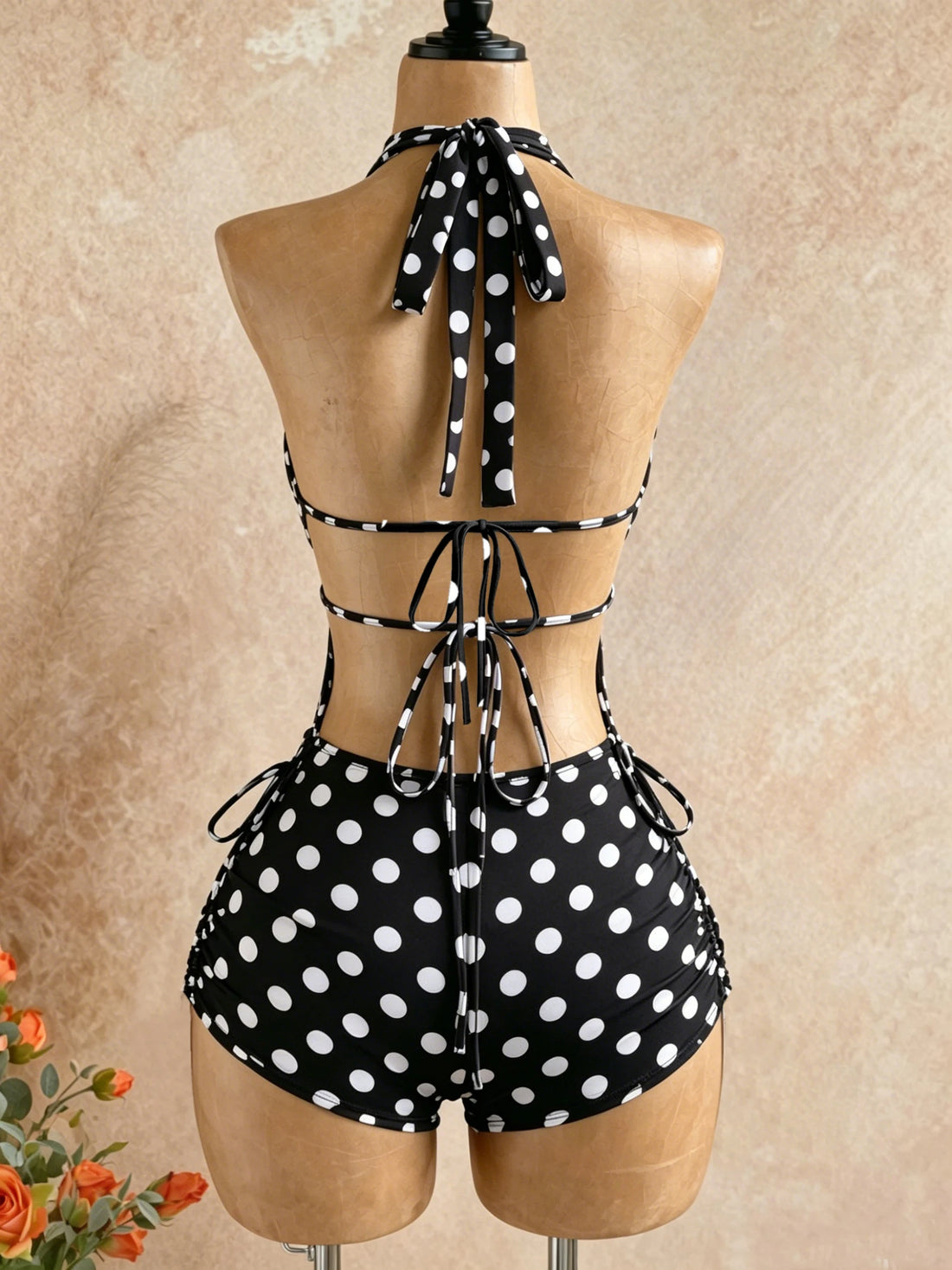 Classic Black and White Polka Dot Jumpsuit with Halter Neck, Tie Straps, Deep V-Cut Chest, Hollow-Out Design + Drawstrings on Both Sides, High-Waisted, Tummy Control, and Covers the Thigh Area